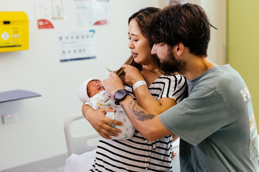 Young family with day old baby