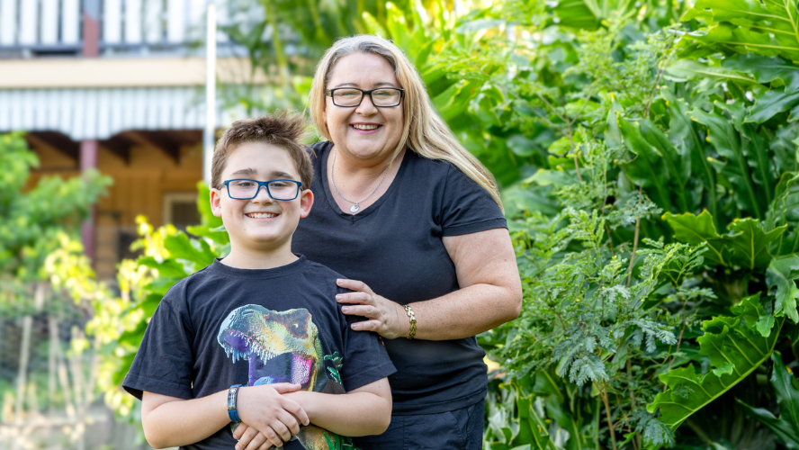 Rachel and her son Cooper, who has diabetes, standing together in their garden